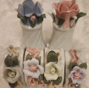 Salt & Pepper porcelain shakers with 4 napkin holders.